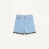 Bermuda en denim avec ourlet à imprimé floral Bermuda en denim avec ourlet à imprimé floral