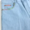 Bermuda en denim avec ourlet à imprimé floral Bermuda en denim avec ourlet à imprimé floral