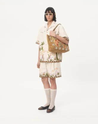Bermuda en toile de coton avec broderies florales et bordures jacquard