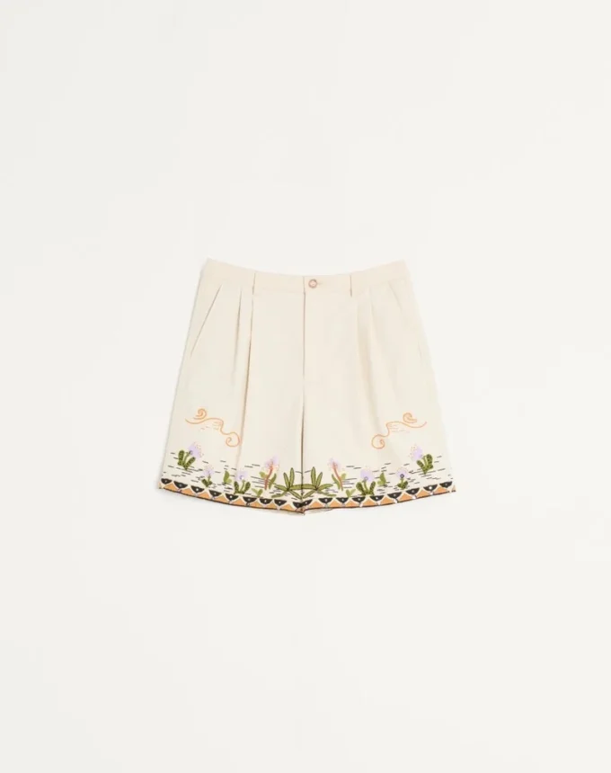 Bermuda en toile de coton avec broderies florales et bordures jacquard Bermuda en toile de coton avec broderies florales et bordures jacquard