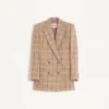 Blazer en laine à double boutonnage et motif à carreaux Blazer en laine à double boutonnage et motif à carreaux