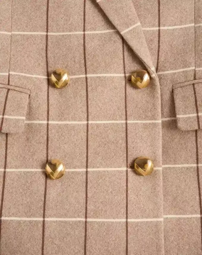Blazer en laine à double boutonnage et motif à carreaux Blazer en laine à double boutonnage et motif à carreaux