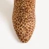 Botte Hotty en cuir de veau effet poney avec broderies florales et fourrure 100 mm Botte Hotty en cuir de veau effet poney avec broderies florales et fourrure 100 mm