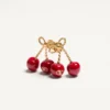 Boucles d’oreilles Cherryfic en métal et émail Boucles d’oreilles Cherryfic en métal et émail