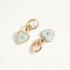 Boucles d&rsquo;oreilles Coeur Hyperbole en métal, résine et cristaux Swarovski®