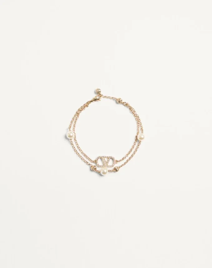 Bracelet Vlogo Signature en métal, perles et cristaux Swarovski® Bracelet Vlogo Signature en métal, perles et cristaux Swarovski®