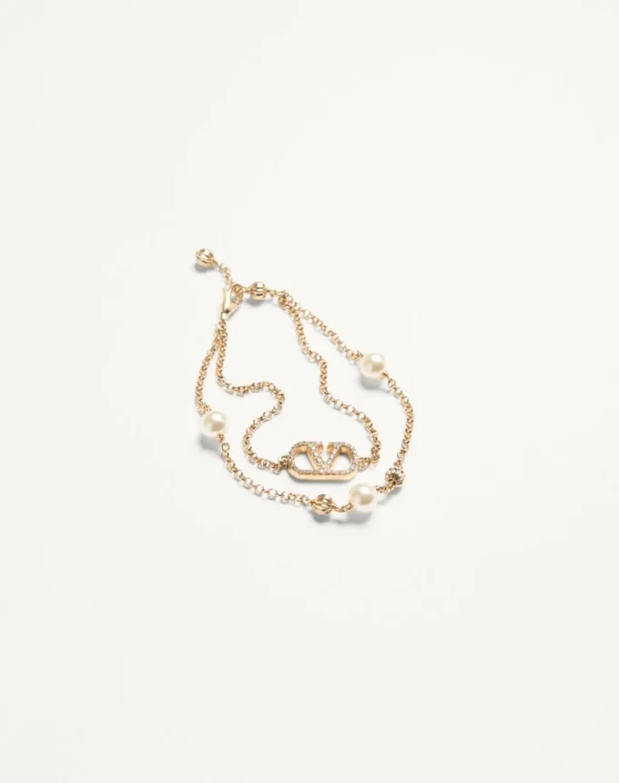 Bracelet Vlogo Signature en métal, perles et cristaux Swarovski® Bracelet Vlogo Signature en métal, perles et cristaux Swarovski®