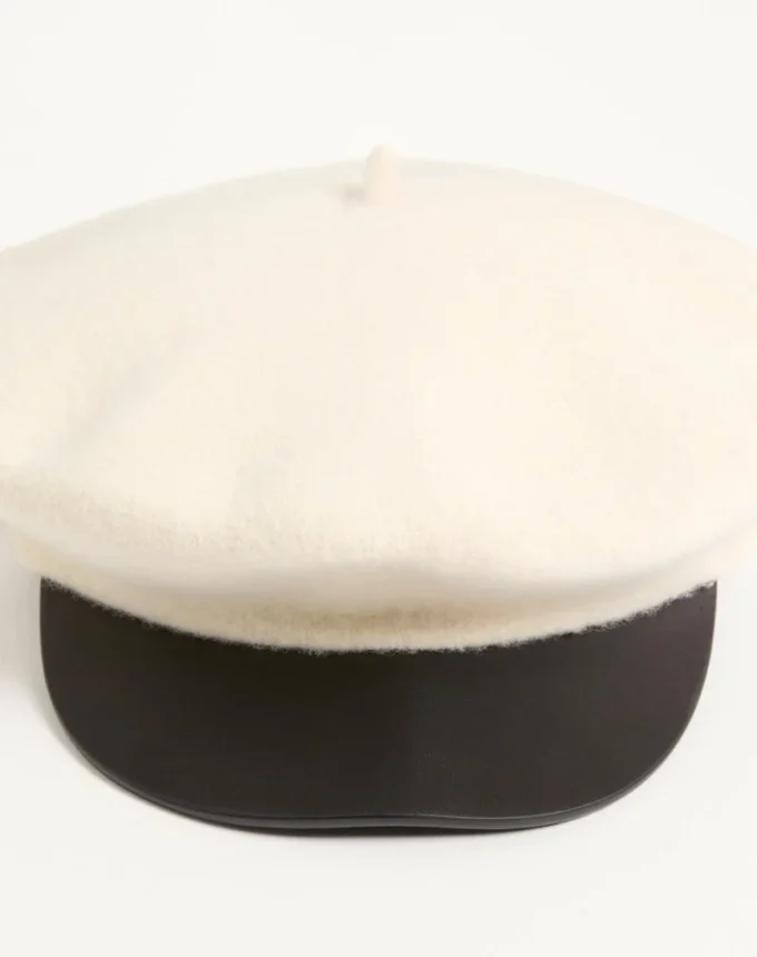 Casquette en laine VLogo Signature Valentino Garavani avec visière en cuir Casquette en laine VLogo Signature Valentino Garavani avec visière en cuir