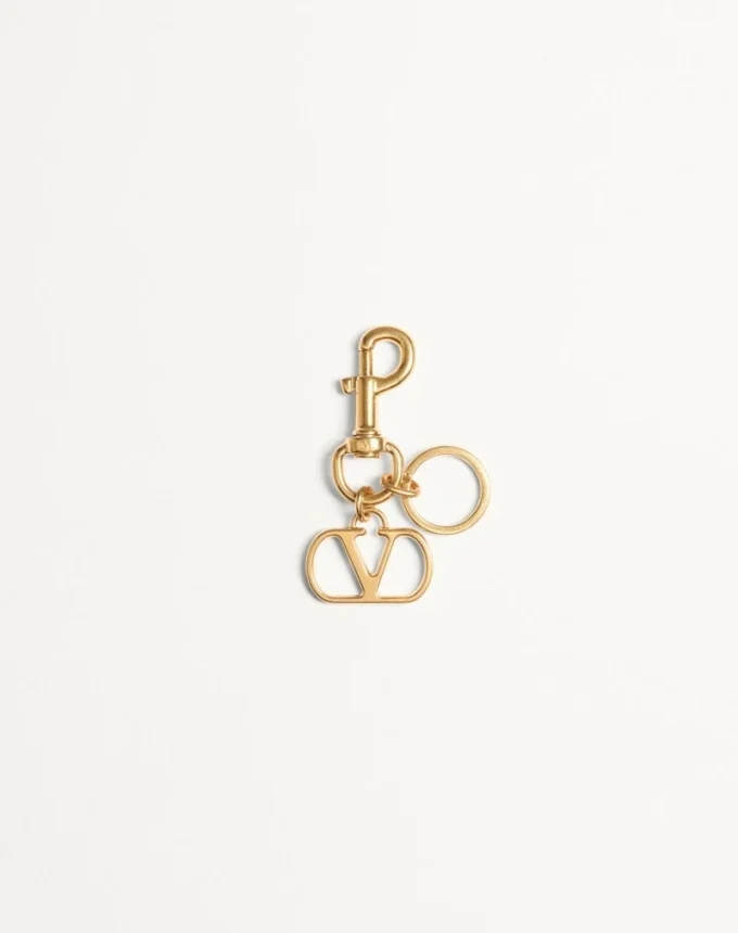 Charm métallique Vlogo Signature avec porte-clés