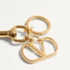 Charm métallique Vlogo Signature avec porte-clés