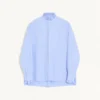 Chemise en coton avec plastron et volants Chemise en coton avec plastron et volants