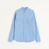Chemise en denim avec cabochons Chemise en denim avec cabochons