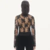Chemise en dentelle avec nœuds Chemise en dentelle avec nœuds