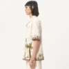 Chemise en toile de coton avec broderies florales Chemise en toile de coton avec broderies florales