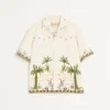 Chemise en toile de coton avec broderies florales Chemise en toile de coton avec broderies florales