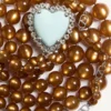 Collier Coeur Hyperbole en métal, résine et cristaux Collier Coeur Hyperbole en métal, résine et cristaux