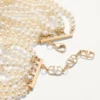 Collier Fleur Lumineuse en métal, émail, perles et tissu Collier Fleur Lumineuse en métal, émail, perles et tissu