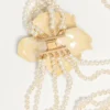 Collier Fleur Lumineuse en métal, émail, perles et tissu Collier Fleur Lumineuse en métal, émail, perles et tissu