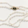 Collier ovale en métal, perles et émail