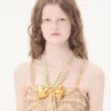 Collier Trop Chou en métal, émail, perles et cristaux Collier Trop Chou en métal, émail, perles et cristaux