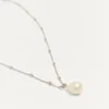 Collier Vlogo Signature en métal, perles et cristaux Swarovski® Collier Vlogo Signature en métal, perles et cristaux Swarovski®
