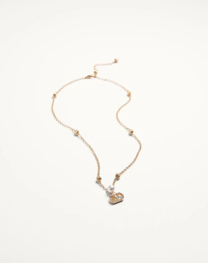 Collier VLogo Signature en métal, perles et cristaux Swarovski® Collier VLogo Signature en métal, perles et cristaux Swarovski®