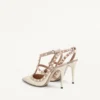 Escarpins à bride Rockstud en cuir verni 100 mm Escarpins à bride Rockstud en cuir verni 100 mm
