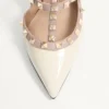 Escarpins à bride Rockstud en cuir verni 100 mm Escarpins à bride Rockstud en cuir verni 100 mm