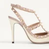 Escarpins à bride Rockstud en cuir verni 100 mm Escarpins à bride Rockstud en cuir verni 100 mm