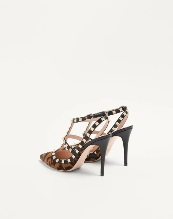 Escarpins Rockstud à lanières en cuir de veau effet poney 100 mm Escarpins Rockstud à lanières en cuir de veau effet poney 100 mm