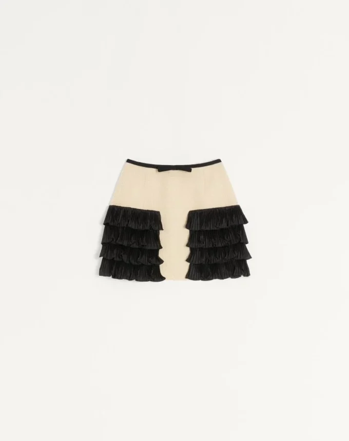 Jupe courte en tweed de laine uni Jupe courte en tweed de laine uni
