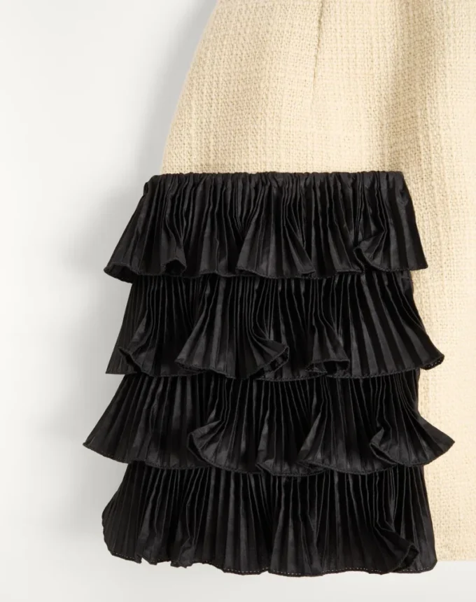 Jupe courte en tweed de laine uni Jupe courte en tweed de laine uni