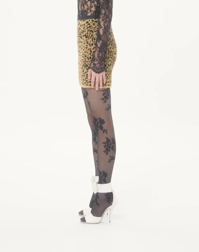 Jupe en maille lurex jacquard à imprimé animalier Jupe en maille lurex jacquard à imprimé animalier