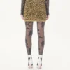 Jupe en maille lurex jacquard à imprimé animalier Jupe en maille lurex jacquard à imprimé animalier