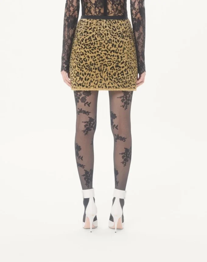 Jupe en maille lurex jacquard à imprimé animalier Jupe en maille lurex jacquard à imprimé animalier