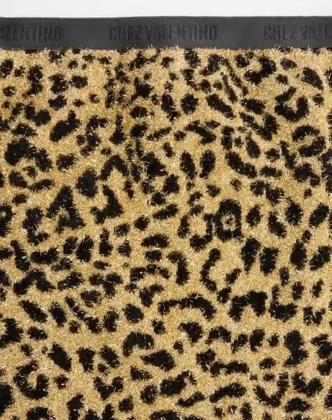 Jupe en maille lurex jacquard à imprimé animalier Jupe en maille lurex jacquard à imprimé animalier