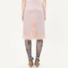Jupe en satin avec plumes Jupe en satin avec plumes