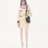 Jupe en tweed de laine uni Jupe en tweed de laine uni