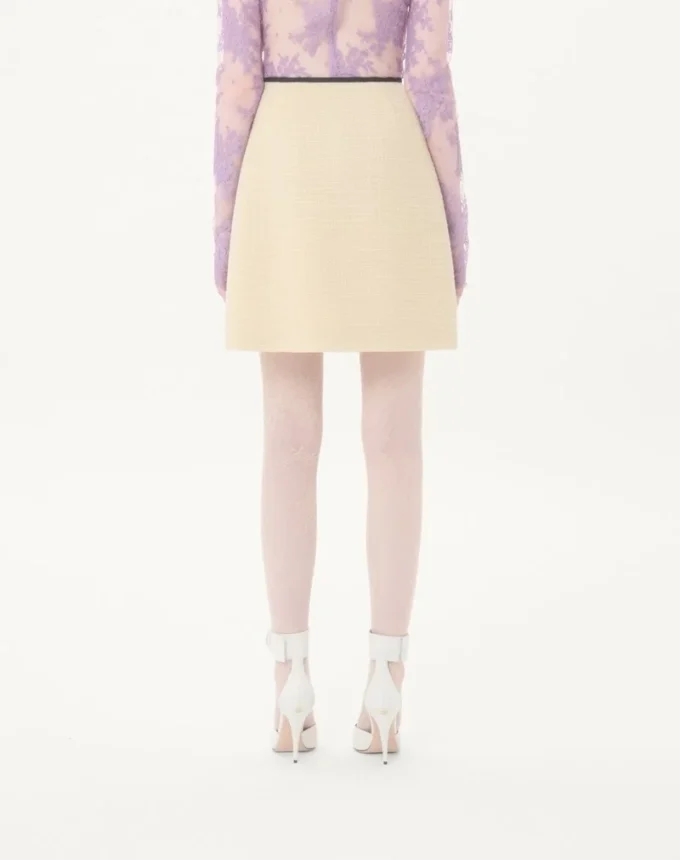 Jupe en tweed de laine uni Jupe en tweed de laine uni