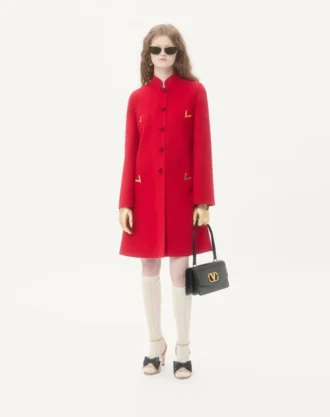 Manteau drapé compact