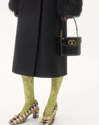 Manteau drapé compact