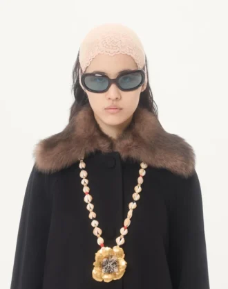 Manteau drapé en laine