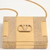Minaudière Minaumorphe Valentino Garavani en métal avec cristaux Swarovski® et étui en satin Minaudière Minaumorphe Valentino Garavani en métal avec cristaux Swarovski® et étui en satin