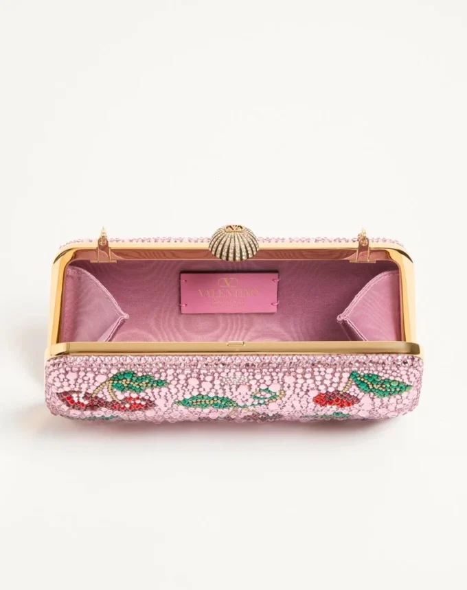 Minaudière Valentino Garavani Carry Secrets avec motif en strass Cherryfic Minaudière Valentino Garavani Carry Secrets avec motif en strass Cherryfic