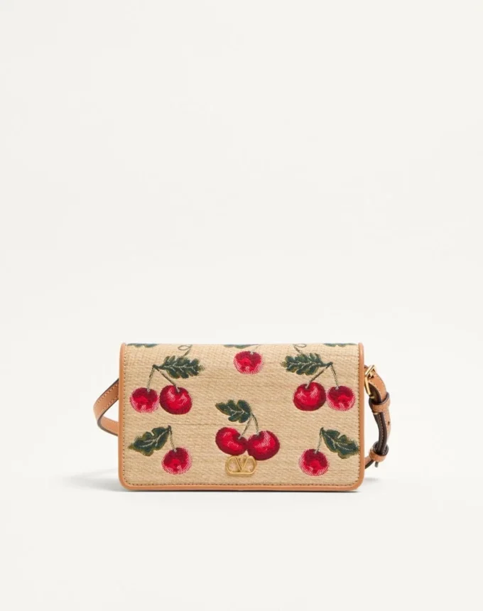 Mini sac à bandoulière Vlogo Signature en raphia jacquard avec motif Cherryfic Mini sac à bandoulière Vlogo Signature en raphia jacquard avec motif Cherryfic