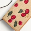 Mini sac à bandoulière Vlogo Signature en raphia jacquard avec motif Cherryfic Mini sac à bandoulière Vlogo Signature en raphia jacquard avec motif Cherryfic