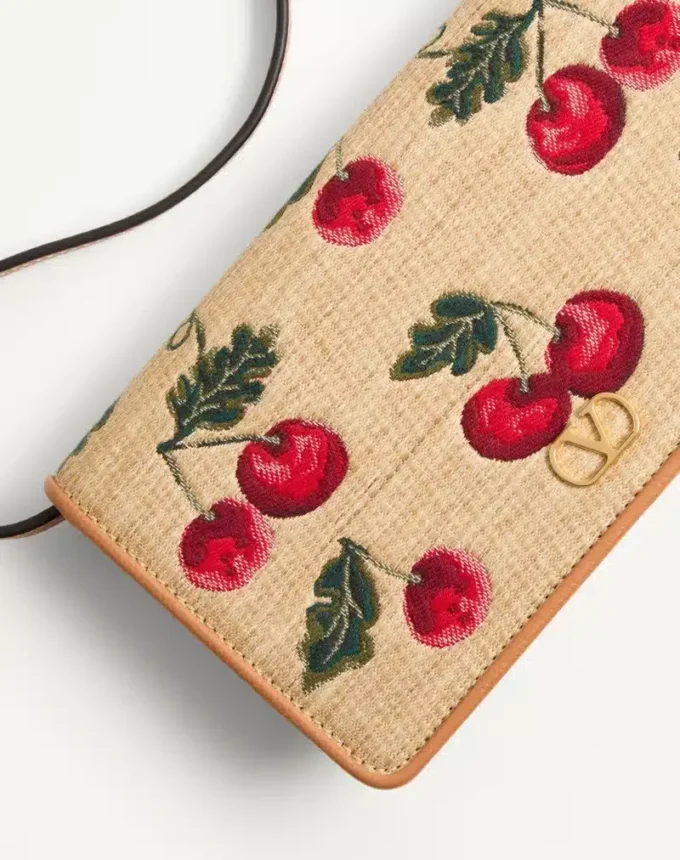 Mini sac à bandoulière Vlogo Signature en raphia jacquard avec motif Cherryfic Mini sac à bandoulière Vlogo Signature en raphia jacquard avec motif Cherryfic