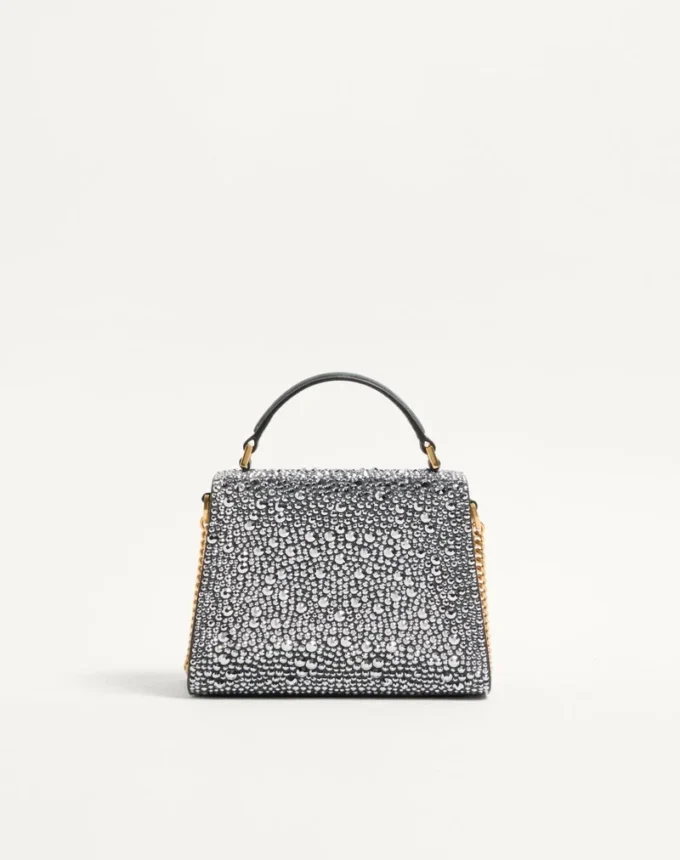 Mini sac à main Valentino Garavani Vsling avec strass et logo bijou Mini sac à main Valentino Garavani Vsling avec strass et logo bijou
