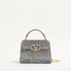 Mini sac à main Valentino Garavani Vsling avec strass et logo bijou Mini sac à main Valentino Garavani Vsling avec strass et logo bijou