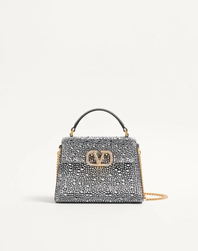 Mini sac à main Valentino Garavani Vsling avec strass et logo bijou Mini sac à main Valentino Garavani Vsling avec strass et logo bijou